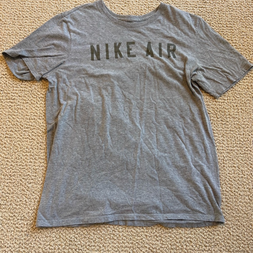 gray nike shirt sleeve. size medium